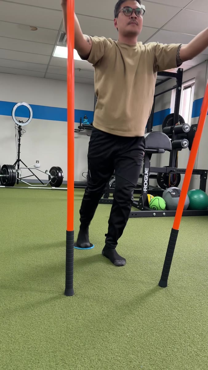 Patient performing resistance-band training during a therapy session